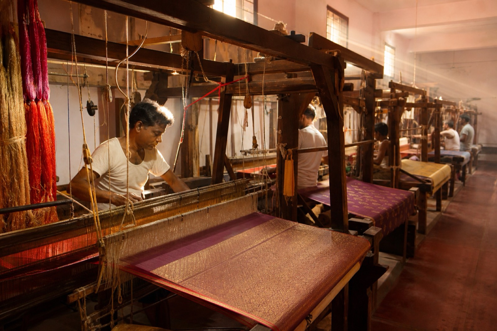 Handlooms in a silk weaving workshop